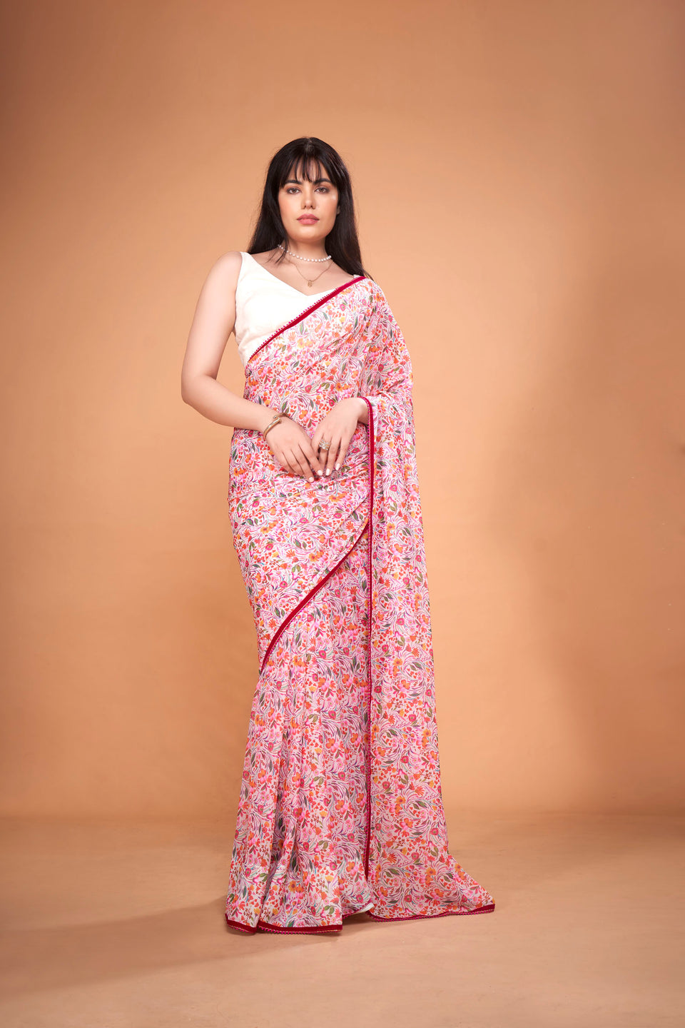 Ivory Floral Printed Chiffon Saree with Pink Velvet and Pink Samosa Lace | Vogzy